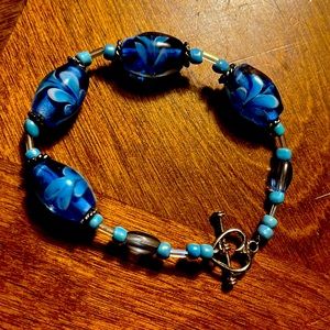 Beautiful blue blown glass floral bracelet